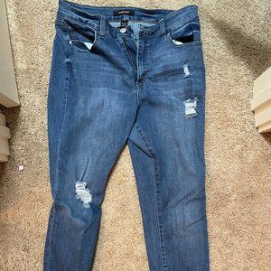 pre-ripped denim jeans, size 12